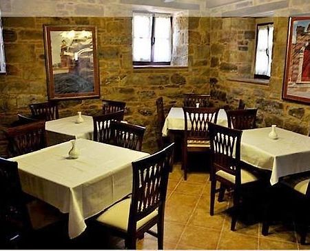 Riziko Airport Hotel Kampochora  Restaurant photo
