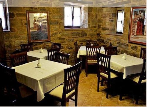 Riziko Airport Hotel Kampochora  Restaurant photo
